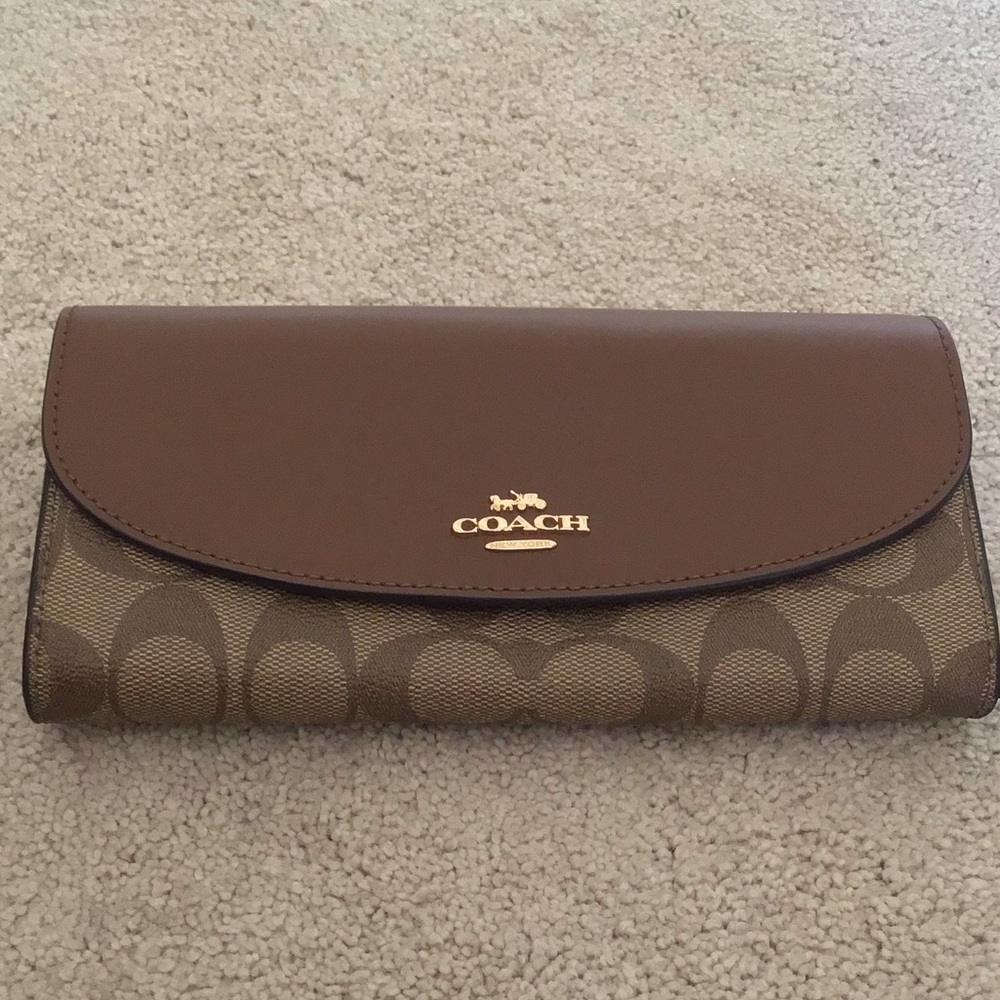 Coach Brown Signature PVC and Leather Saddle Flap Continental Wallet